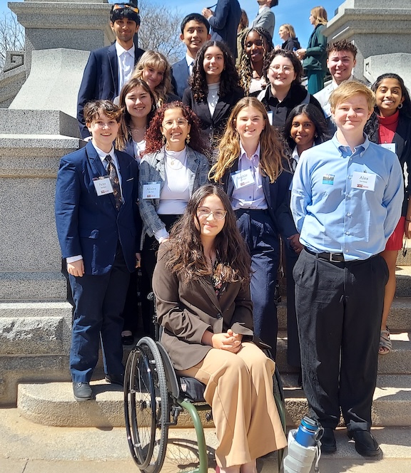 COYAC members wearing business professional attire pose on the south steps of the Colorado State Capitol Building